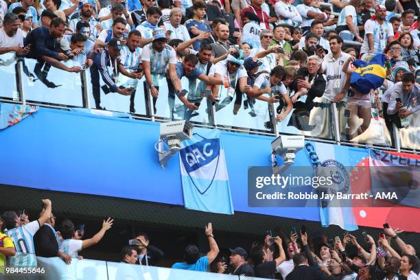 Argentina legend Diego Maradona waves as fans react prior to the 2018 FIFA World Cup Russia group D match between Nigeria and Argentina at Saint...