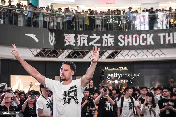 Player Klay Thompson of the Golden State Warriors celebrate a goal in a fans meeting on June 26, 2018 in Zhengzhou, China.