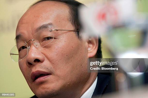 Xu Ping, chairman of Dongfeng Motor Group Co., speaks at the company's 2009 results announcement in Hong Kong, China, on Wednesday, April 14, 2010....