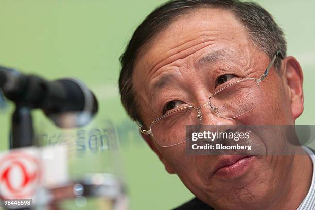 Zhou Wenjie, executive vice president of Dongfeng Motor Group Co., attends the company's 2009 results announcement in Hong Kong, China, on Wednesday,...