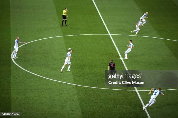 Johann Gudmundsson of Iceland passes the ball for kick off during the 2018 FIFA World Cup Russia group D match between Iceland and Croatia at Rostov...