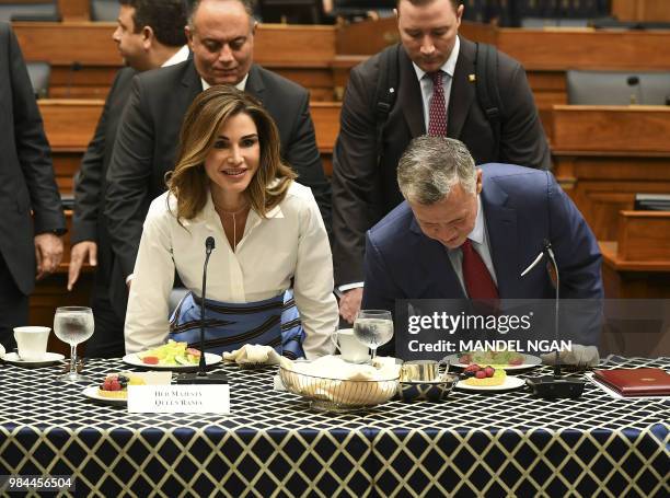 Jordan's King Abdullah II and Queen Rania arrive for lunch ahead of a meeting with House Foreign Affairs Committee Chairman Ed Royce, R-CA, in the...