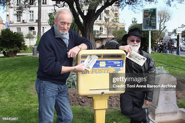 Charles Dance , Terry Pratchett attend a photocall during MIPTV at Palais des festivals on April 13, 2010 in Cannes, France.