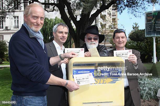 Charles Dance , Terry Pratchett attend a photocall during MIPTV at Palais des festivals on April 13, 2010 in Cannes, France.