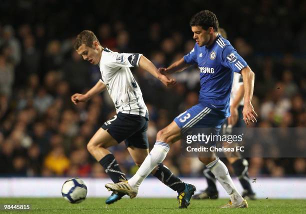Jack Wilshere of Bolton Wanderers is closed down by Michael Ballack of Chelsea during the Barclays Premier League match between Chelsea and Bolton...