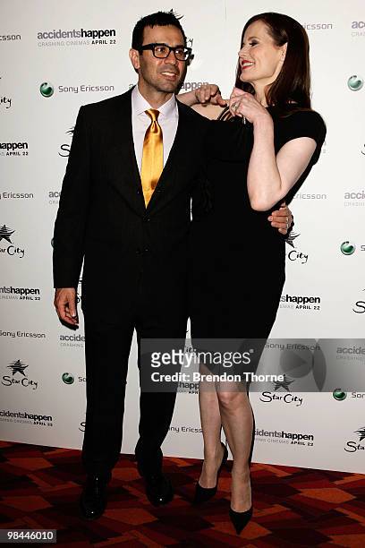 Geena Davis and husband Reza Jarrahy attend the premiere of "Accidents Happen" at The Cremorne Orpheum on April 14, 2010 in Sydney, Australia.