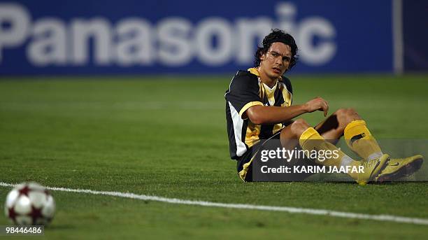 Qatar club's Sebastian Soria eyes the ball as he sits on the field during the first leg of the GCC Clubs Championship final against UAE's Al-Wasl...