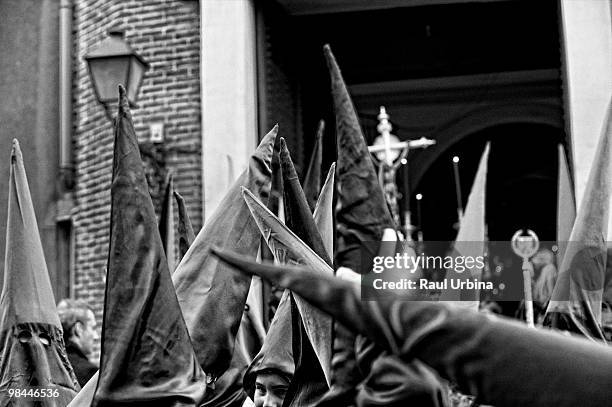 Penitents of the brotherhood of Poor Jesus take part in a voyage through the streets during Holy Week on April 2, 2010 in Madrid, Spain.