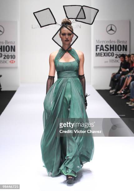 Model walks the runway wearing David Salomon during Mercedes-Benz Fashion Mexico Autumn Winter 2010 at Campo Marte on April 13, 2010 in Mexico City,...