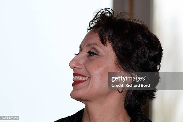 Singer Luz Casal poses before being decorated with the 'Honor medal of the city of Paris' by Bertrand Delanoe at Hotel de Ville on April 13, 2010 in...