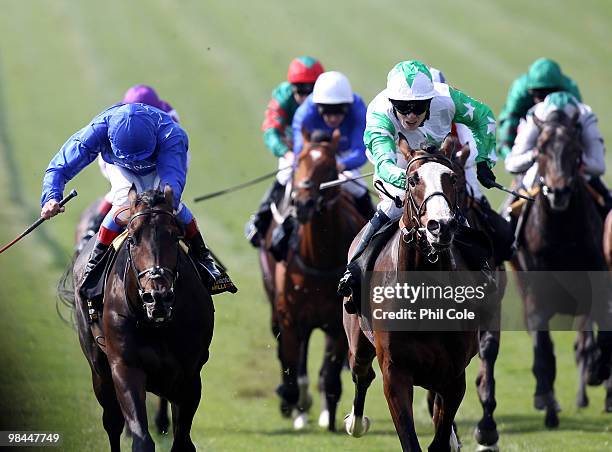 Coordinated Cut ridden by Jamie Spencer with the green and white hat holds off Ammer ridden by Frankie Dettori to win the Tattersalls Timeform 3-Y-O...