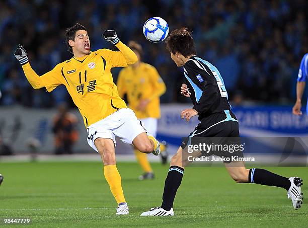 Hiroki Ito of Kawasaki Frontale and Molina of Seongnam Ilhwa compete for the ball during the AFC Champions League match between Kawasaki Frontale and...