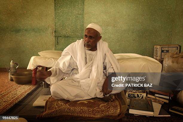 Sudanese Sufi Sheikh al-Khalifa al-Tayeb al-Gid, leader of the Qadiriya Sufi school, sits in his room in the village of Umm Dawban, 40 kms north of...