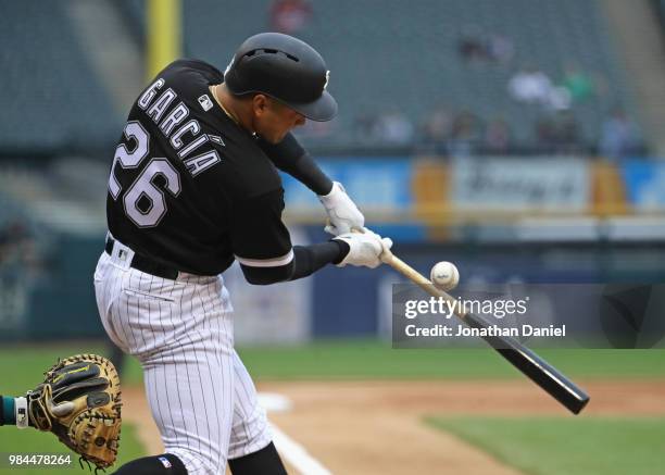 Avisail Garcia of the Chicago White Sox bats against the Oakland Athletics at Guaranteed Rate Field on June 22, 2018 in Chicago, Illinois. The...