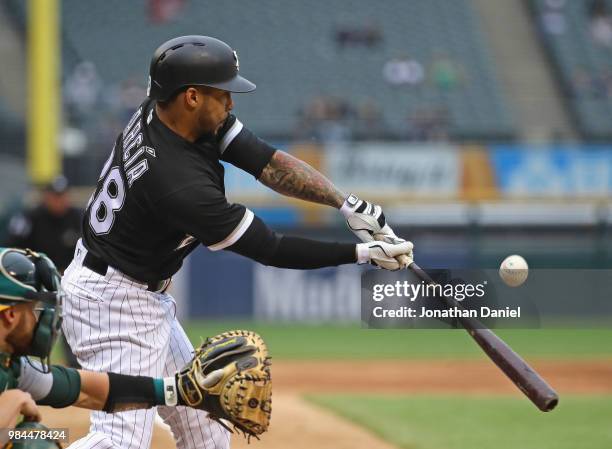 Leury Garcia of the Chicago White Sox bats against the Oakland Athletics at Guaranteed Rate Field on June 22, 2018 in Chicago, Illinois. The...