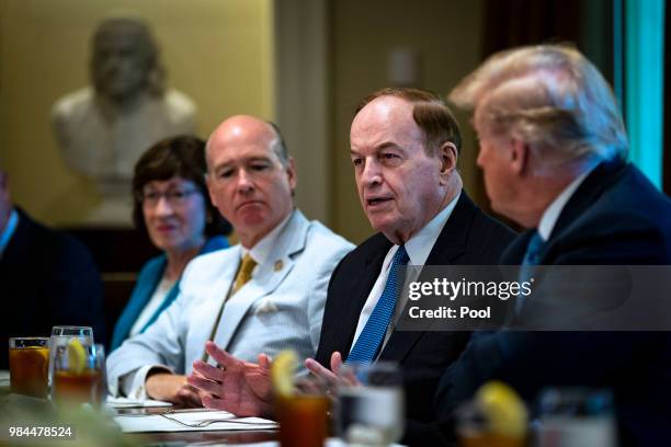 Sen. Richard Shelby speaks as U.S. President Donald Trump looks on during a lunch meeting with Republican lawmakers, in the Cabinet Room at the White...