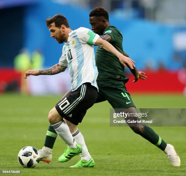 Lionel Messi of Argentina is tackled by Wilfred Ndidi of Nigeria during the 2018 FIFA World Cup Russia group D match between Nigeria and Argentina at...