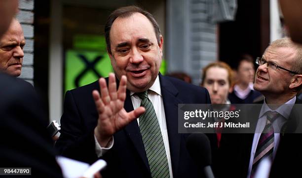 Leader Alex Salmond and SNP candidate John Mason meet with constituents on the campaign trail on April 14, 2010 in Glasgow, Scotland. The General...