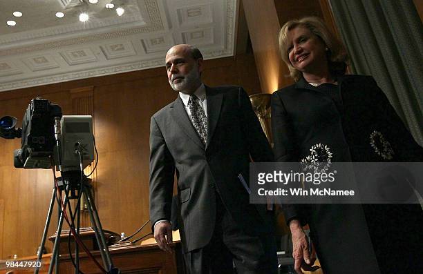 Federal Reserve Board Chairman Ben Bernanke walks with Rep. Carolyn Maloney prior to testifying before the Joint Economic Committee April 14, 2010 in...
