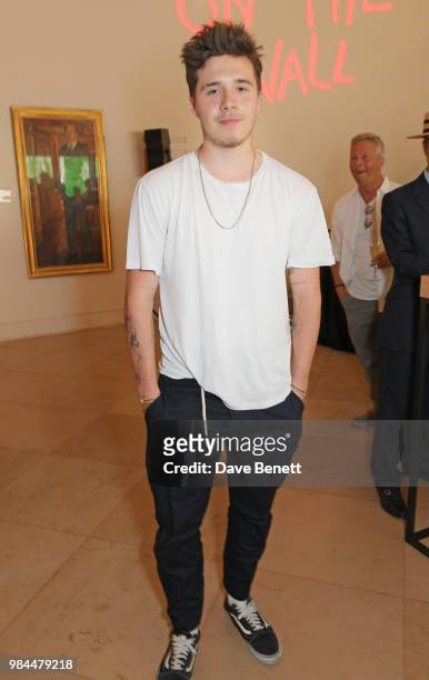 Brooklyn Beckham attends a private view of the "Michael Jackson: On The Wall" exhibition sponsored by HUGO BOSS at the National Portrait Gallery on...