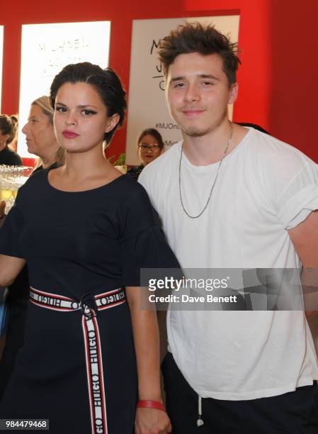 Bip Ling and Brooklyn Beckham attend a private view of the "Michael Jackson: On The Wall" exhibition sponsored by HUGO BOSS at the National Portrait...