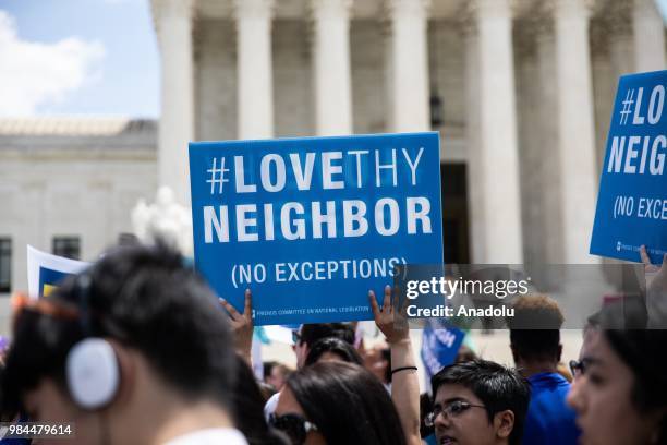 People protest the Muslim travel ban outside of the US Supreme Court in Washington, USA on June 26, 2018.