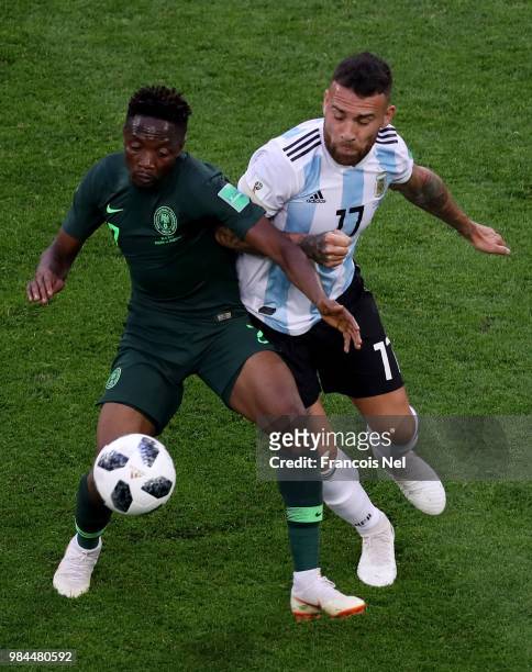 Ahmed Musa of Nigeria is tackled by Nicolas Otamendi during the 2018 FIFA World Cup Russia group D match between Nigeria and Argentina at Saint...