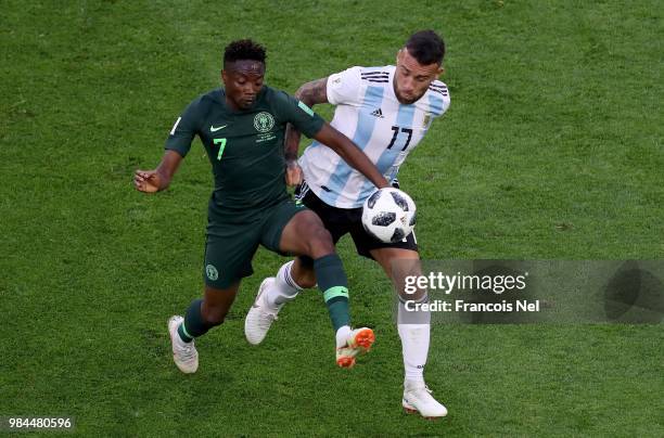 Ahmed Musa of Nigeria is tackled by Nicolas Otamendi during the 2018 FIFA World Cup Russia group D match between Nigeria and Argentina at Saint...