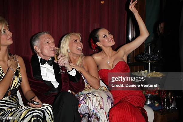 Hugh Hefner, Crystal Harris and Dasha Astafieva attend the Playboy party at the Morgana restaurant on the fourth day of the 59th San Remo Song...