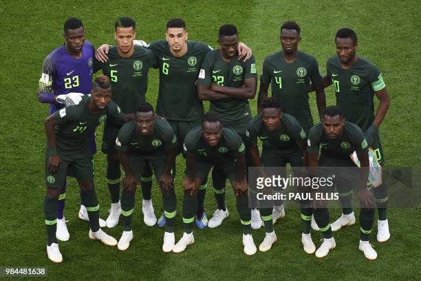 Nigeria's starting eleven pose for a group shot during the Russia 2018 World Cup Group D football match between Nigeria and Argentina at the Saint...