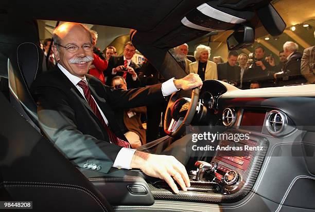 Dieter Zetsche, CEO of Daimler AG, sits in a Mercedes SLS car, at the company's annual shareholder's meeting at Messe Berlin on April 14, 2010 in...