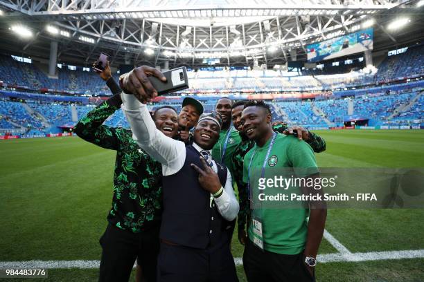 Former Nigeria International Daniel Amokachi poses for a selfie with members of Nigeria squad prior to the 2018 FIFA World Cup Russia group D match...