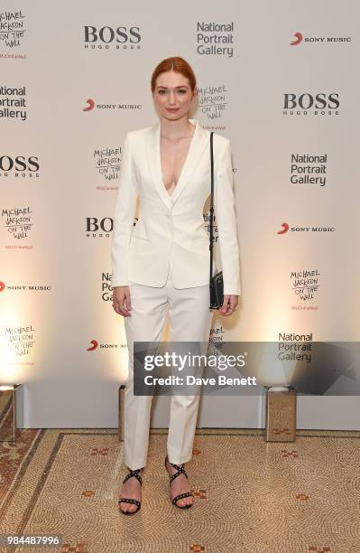 Eleanor Tomlinson attends a private view of the "Michael Jackson: On The Wall" exhibition sponsored by HUGO BOSS at the National Portrait Gallery on...