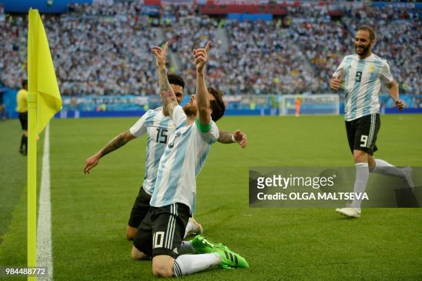Argentina's forward Lionel Messi celebrates his goal during the Russia 2018 World Cup Group D football match between Nigeria and Argentina at the...