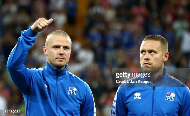 Ragnar Sigurdsson of Iceland and Sverrir Ingason of Iceland look on prior to the 2018 FIFA World Cup Russia group D match between Iceland and Croatia...