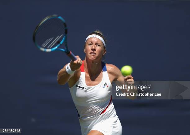 Pauline Parmentier of France in action against Carina Witthoeft of Germany in their Round One match during Day One of the Fuzion 100 Southsea Trophy...