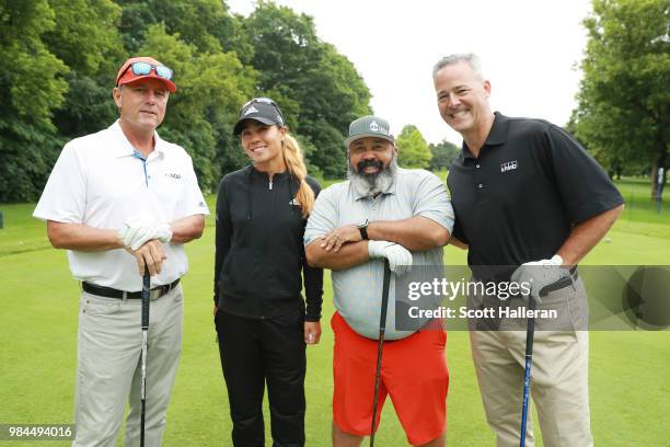 Jerry Foltz, Danielle Kang, Michael Collins and Chris Goodman pose together on the first tee during the pro-am prior to the start of the KPMG Women's...