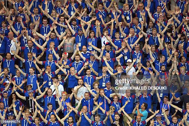 Iceland fans clap during the Russia 2018 World Cup Group D football match between Iceland and Croatia at the Rostov Arena in Rostov-On-Don on June...