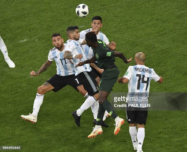 Nigeria's midfielder Onyinye Ndidi heads the ball during the Russia 2018 World Cup Group D football match between Nigeria and Argentina at the Saint...