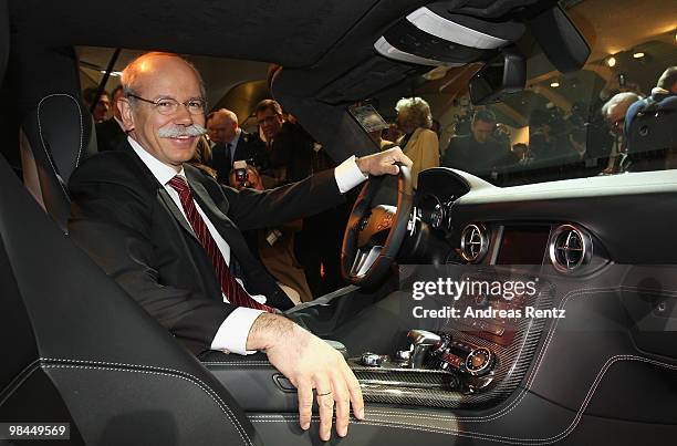 Dieter Zetsche, CEO of Daimler AG, sits in a Mercedes SLS car, at the company's annual shareholder's meeting at Messe Berlin on April 14, 2010 in...