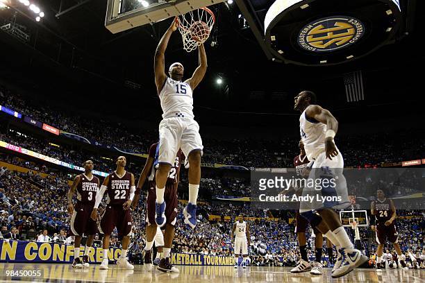 DeMarcus Cousins of the Kentucky Wildcats dunks against the Mississippi State Bulldogs during the final of the SEC Men's Basketball Tournament at the...
