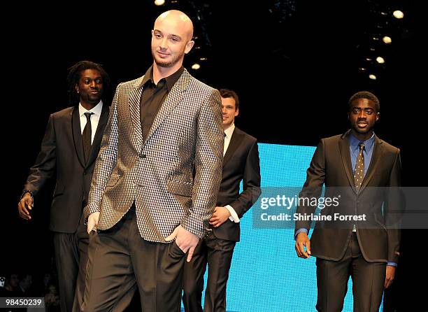 Footballer Stephen Ireland, Emmanuel Adebayor and Kolo Touré model Selfridges collection at Fashion Kicks in aid of Macmillan Cancer Relief at Old...