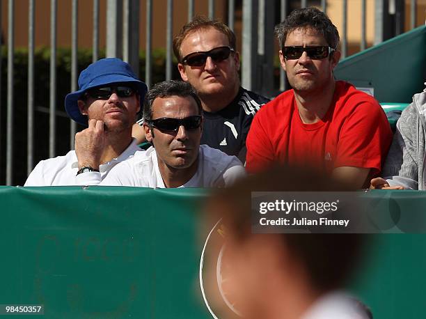 Miles Maclagan, Alex Corretja, Matt Little and Andy Ireland look on as Andy Murray of Great Britain plays in his match against Philipp Kohlschreiber...