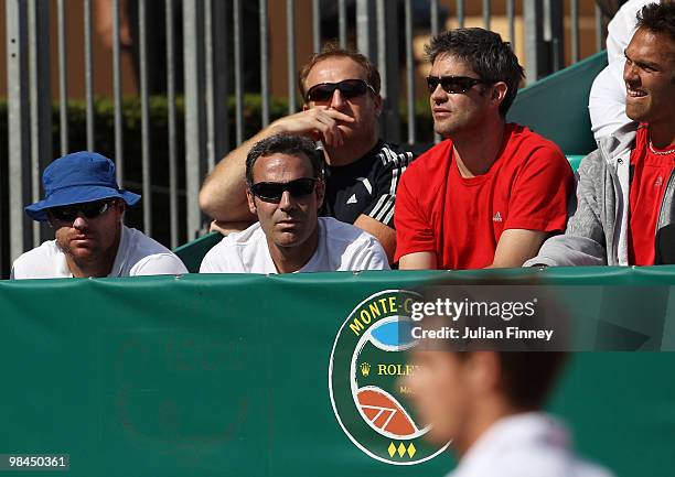 Miles Maclagan, Alex Corretja, Matt Little, Andy Ireland and Ross Hutchins look on as Andy Murray of Great Britain plays in his match against Philipp...