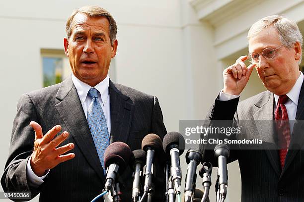 House Minority Leader John Boehner and Senate Minority Leader Mitch McConnell talk to reporters outside of the West Wing after a bipartisan meeting...