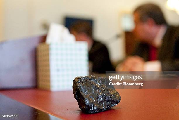 Piece of coal sits on a table during a hearing on coal energy in Washington, D.C., U.S., on Wednesday, April 14, 2010. A hearing of the House Select...