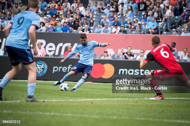 David Villa of New York City takes the shot on goal during the MLS match between New York City FC and Toronto FC at Yankee Stadium on June 24, 2018...
