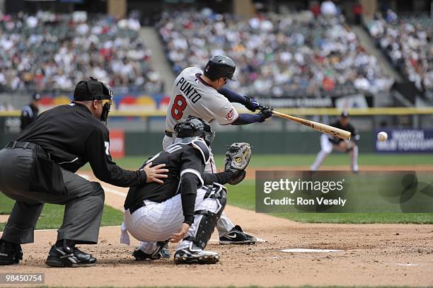 Nick Punto of the Minnesota Twins bats during the game between the Minnesota Twins and the Chicago White Sox on Sunday, April 11 at U.S. Cellular...