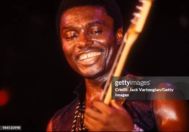 Sam Fan Thomas from Cameroon performs 'makossa' music on guitar and vocals with his band at Club Kilimanjaro in New York, New York, August 3, 1990.