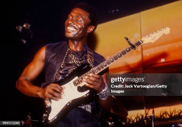 Sam Fan Thomas from Cameroon performs 'makossa' music on guitar and vocals with his band at Club Kilimanjaro in New York, New York, August 3, 1990.